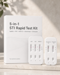 NomaCare 5-in-1 STI Rapid Test Kit with two white test cassettes and premium white packaging